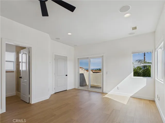 Large third floor bedroom, bathroom, walk-in closet and deck. Also, office or flex space attached, but separated by a wall.