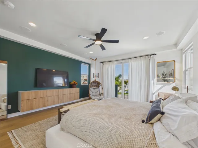 Primary suite with built-in dresser. The small deck off this room is lovely as well.