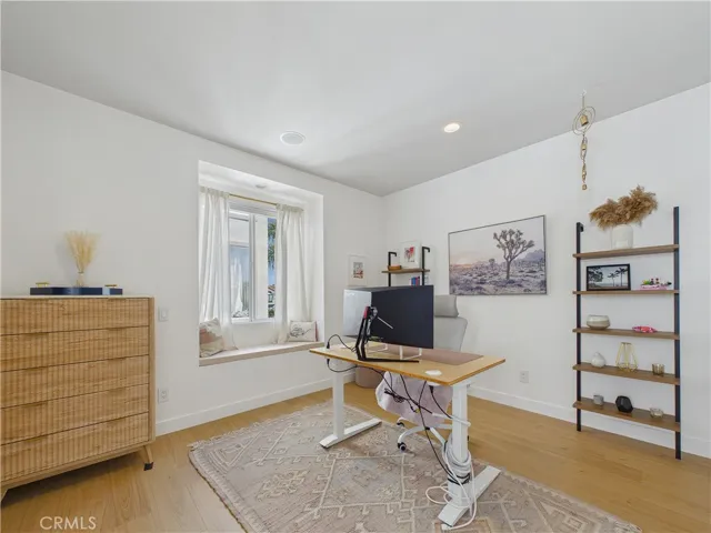 One of three secondary bedrooms with a window seat. 2nd & 3rd bedroom share the 2nd bathroom.