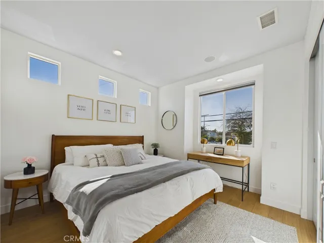 This west facing bedroom is so large that a king size bed and other furniture easily work in this space.