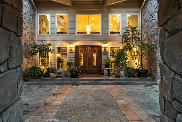 Entry under the portico with natural lighting