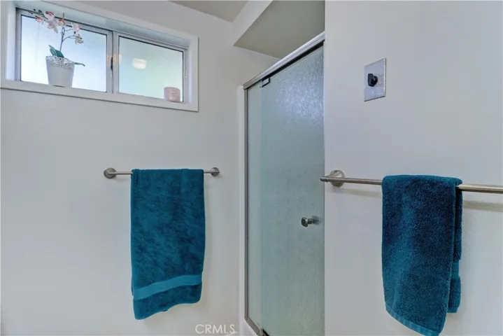 PRIMARY BATHROOM W SHOWER ENCLOSURE