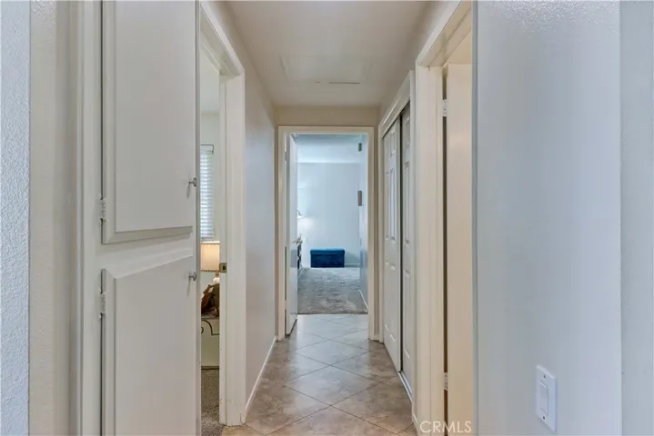 HALLWAY TO THE BEDROOMS & BATHROOMS