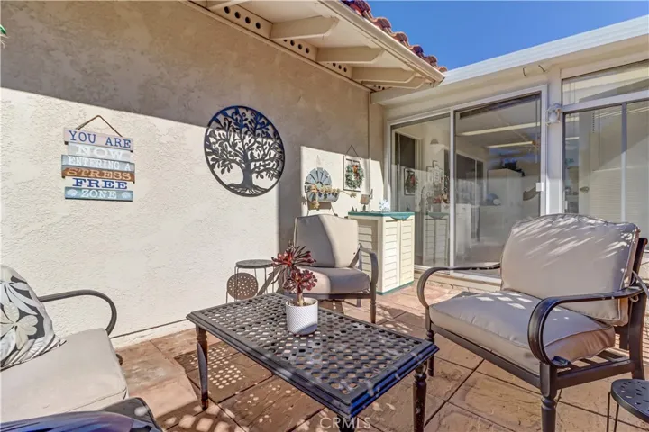 OPEN FRONT PATIO DOORS TO ENCLOSED PATIO