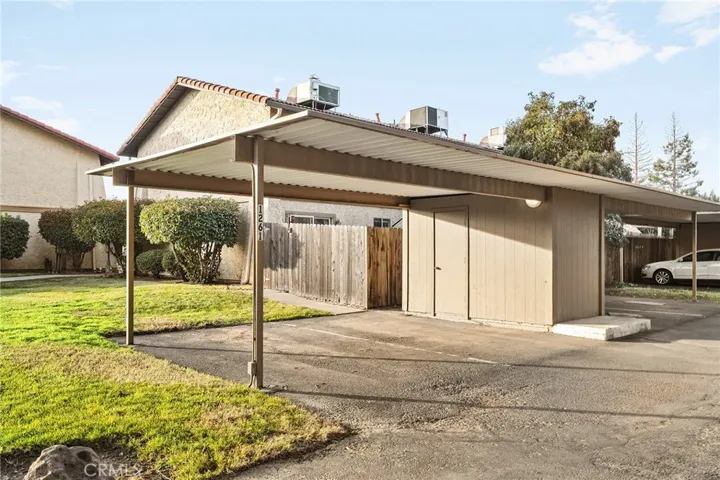 Carport with 2 Assigned Parking spots and Storage