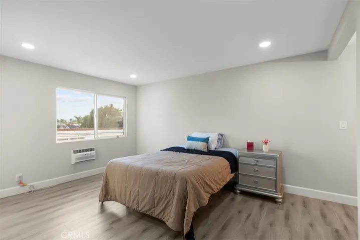 Spacious primary bedroom upstairs