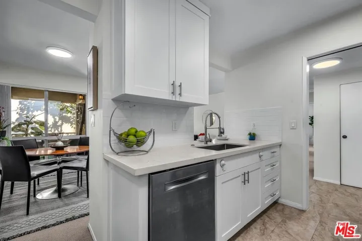 Kitchen with 2 entries