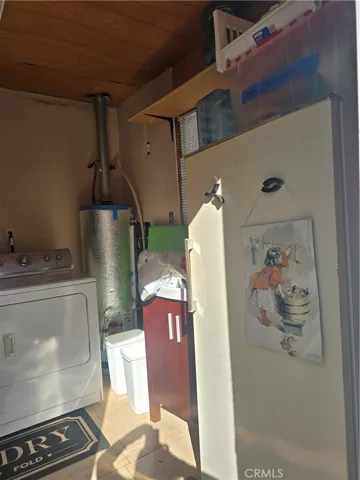 fridge and sink in shed