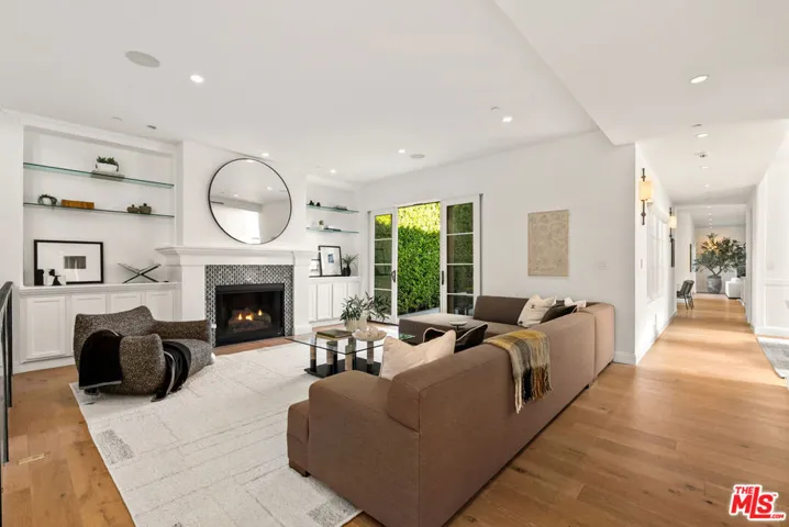 Living Room w/Fireplace & Pool