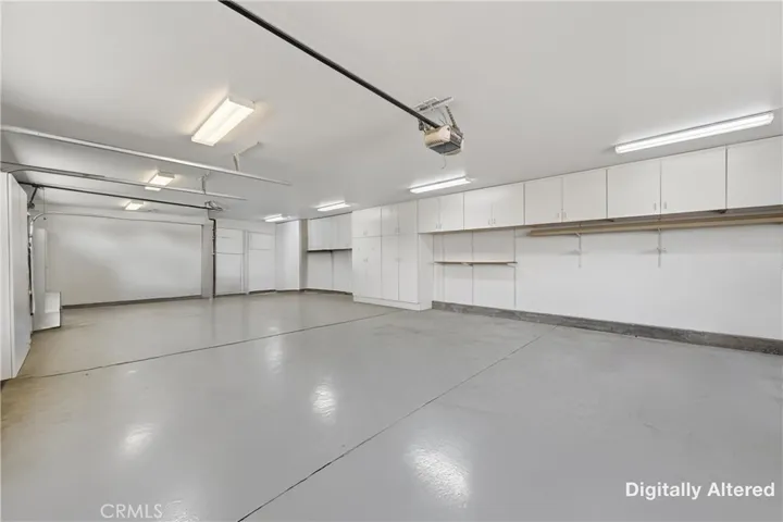 Tons of storage space in the built in cabinets in the garage