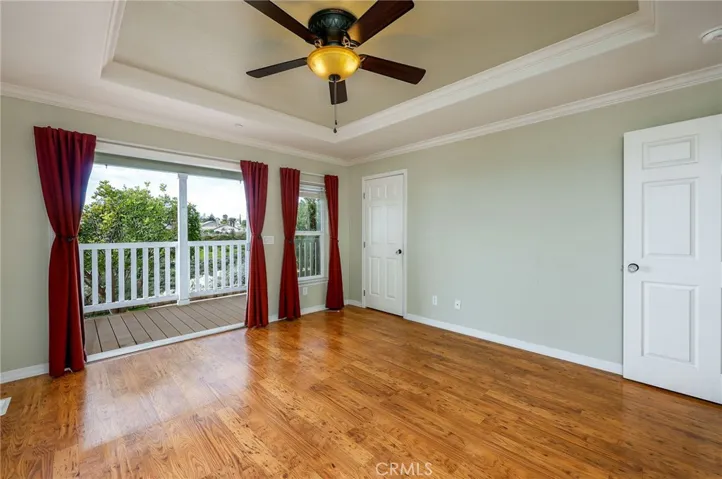 Primary bedroom enjoy the views off the back porch