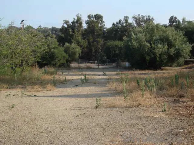 other large gated entrance easy for trucks or????