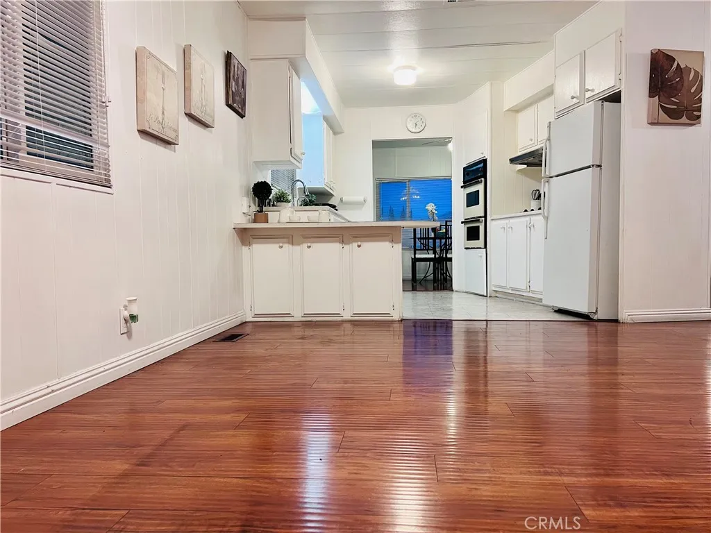 Kitchen next to family room - view 12