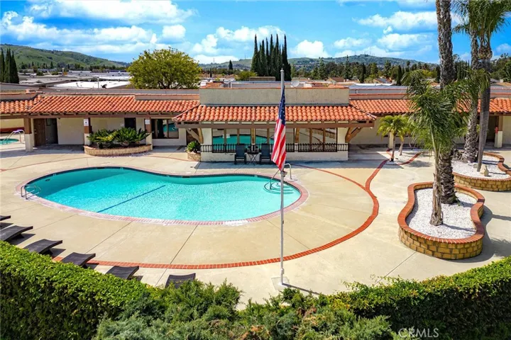 Community swimming pool and clubhouse - view 4