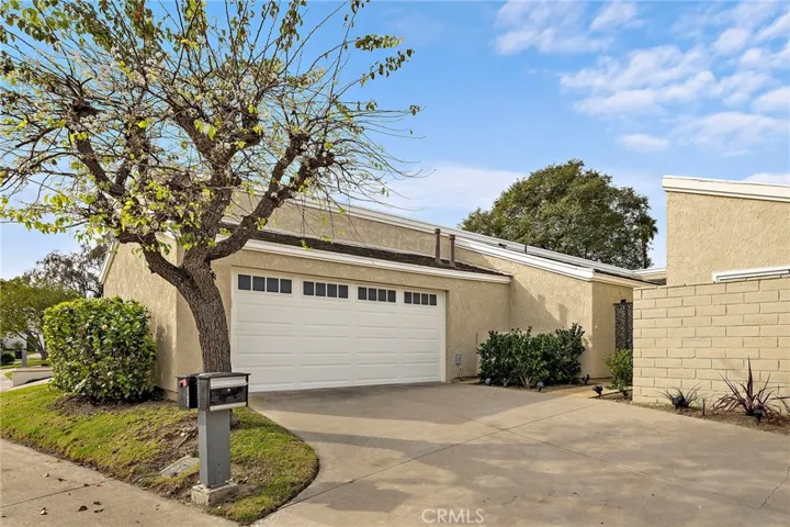 A warm welcome begins at 22881 Mariano Drive, featuring generous driveway parking and a private gated entry that offers both privacy and curb appeal.
