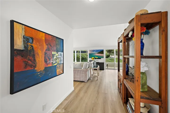 A dining room accented by a beautiful chandelier, perfect for both everyday dining and entertaining.