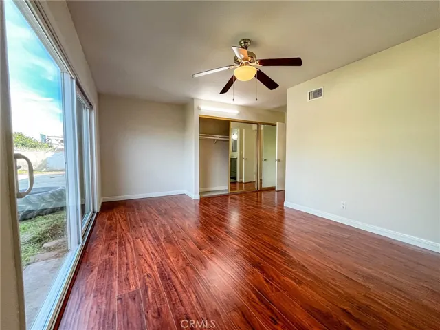 primary suite with slider to backyard