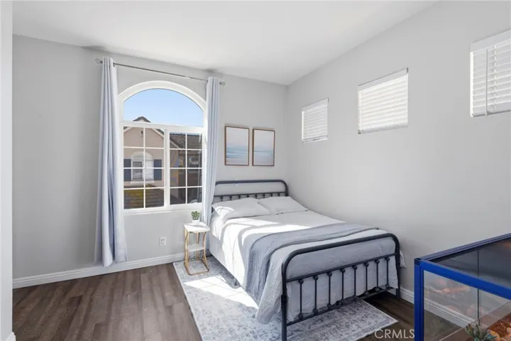 Bathed in natural light, the secondary suite features a full bath—ideal for guests, family, or extended stays.