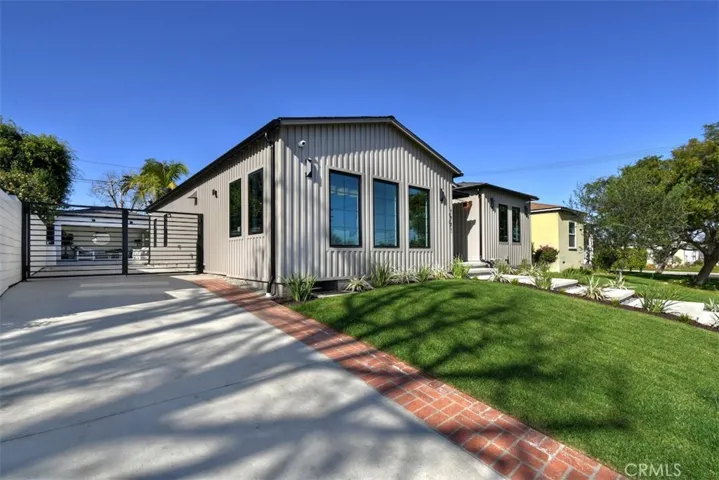 7907 Vicksburg Ave.- Gated, long & wide drive way, lush landscape