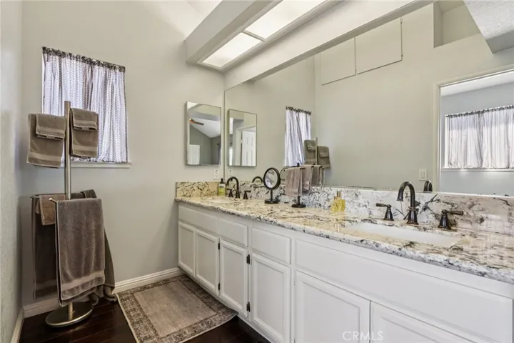 Generous primary suite bath with dual sinks