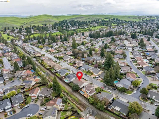 Aerial view of residential area with mountains