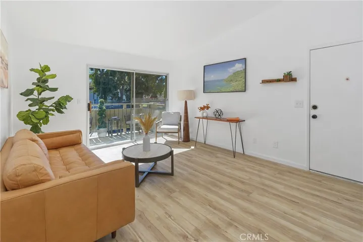 Living room with balcony access.