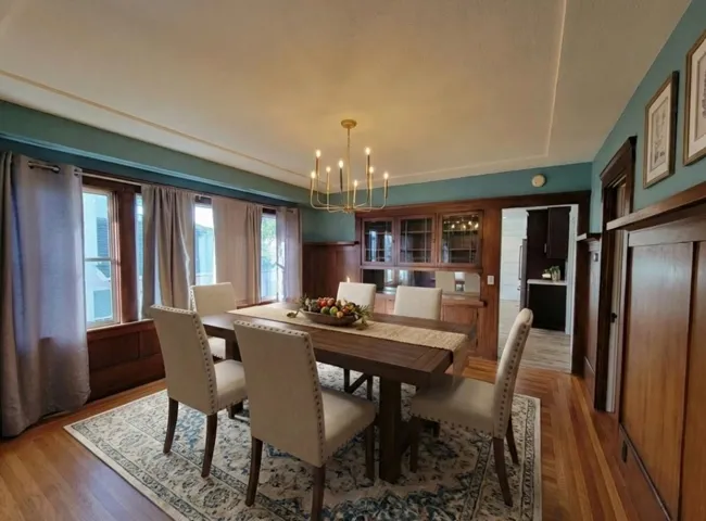 Dining room featuring a chandelier and wood finished floors