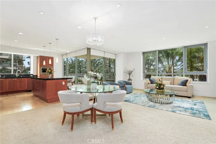 Welcome to 3049 Scholarship in the Plaza! Featuring a bright & airy open floorplan with a wrap around balcony