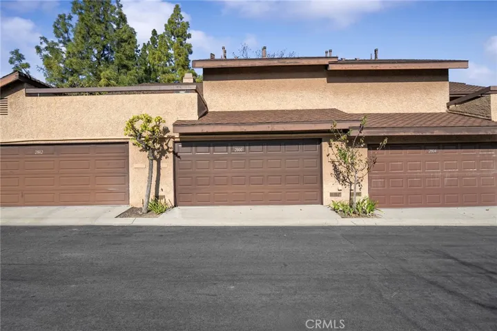 Entrance to Garage & Guest Parking