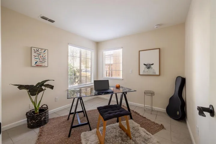 Office featuring light tile patterned floors