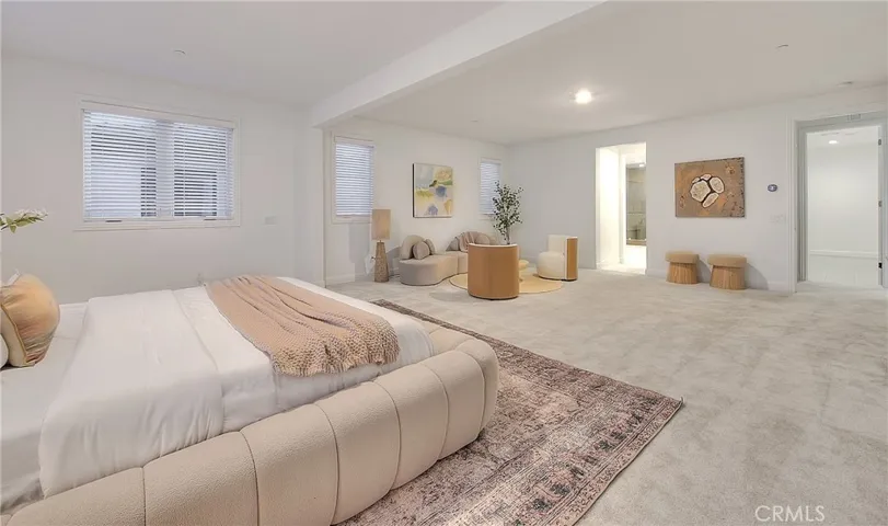 Primary Bedroom.  The seller had the upgrade and extended the primary bedroom space