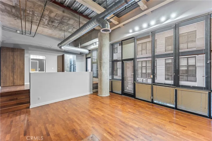 Condo - Living room with wall of windows