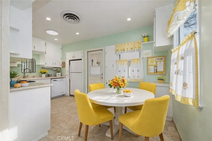 Virtually Staged breakfast nook and kitchen area
