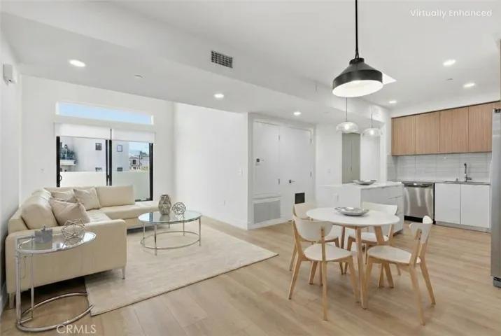 Entry, living room, kitchen (virtually staged)