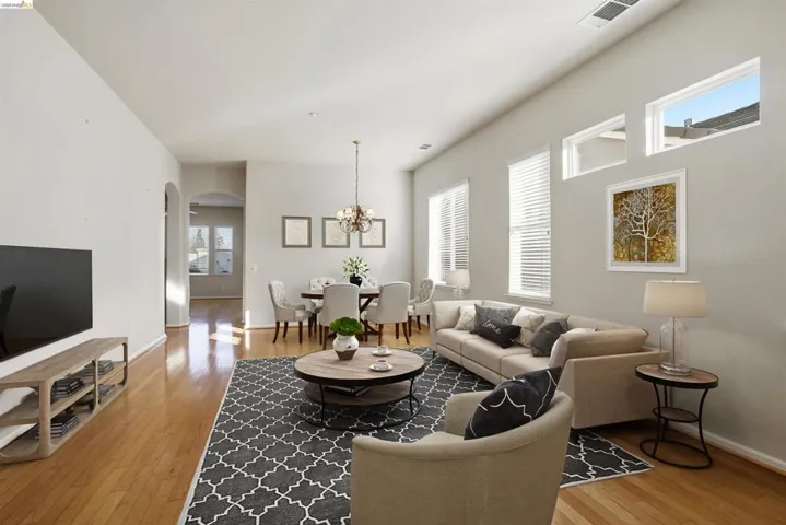 This living room has been virtually staged to showcase how the space can come to life when you move in and make it your own.