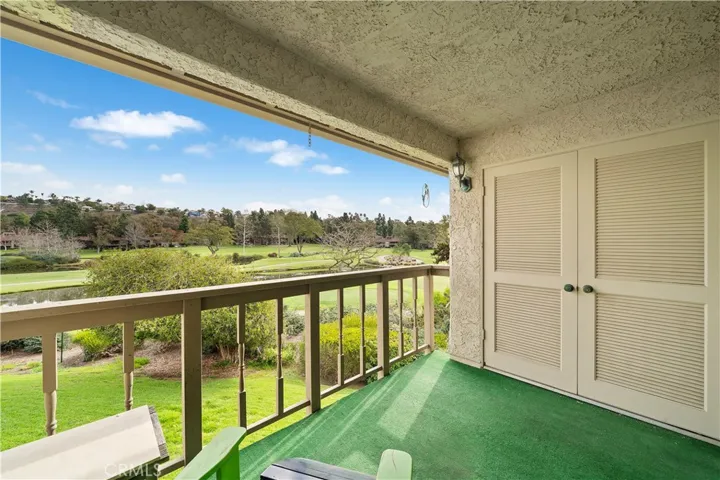Deck area with lake and golf course views