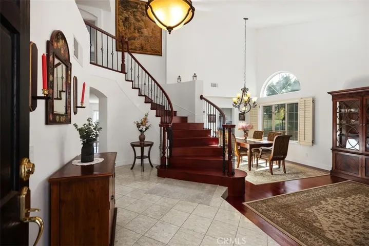 Enter spacious entry with towering ceilings