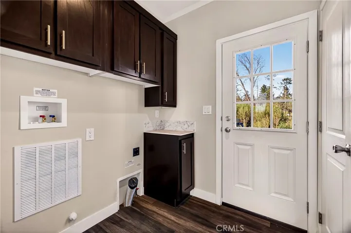 Laundry Room With Access To Backyard