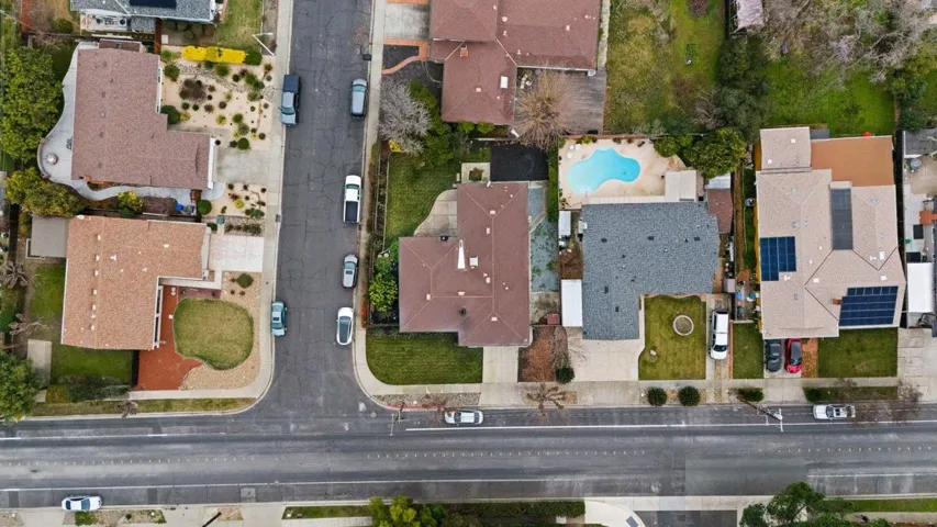 View of property location with nearby suburban area