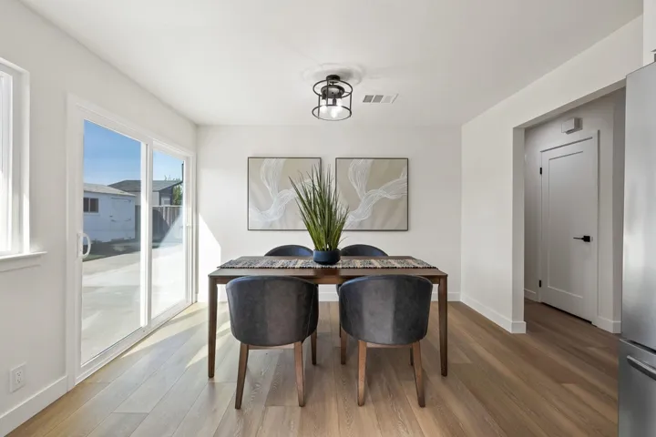 Dining room featuring baseboards and wood finished floors