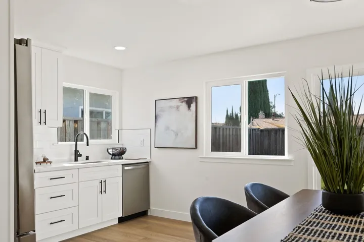 Home office featuring light wood-style floors, plenty of natural light, and recessed lighting