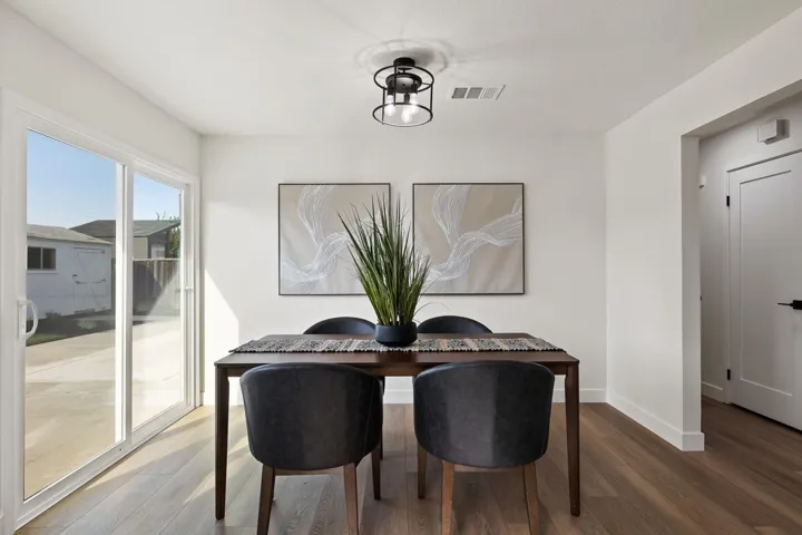 Dining area with wood finished floors