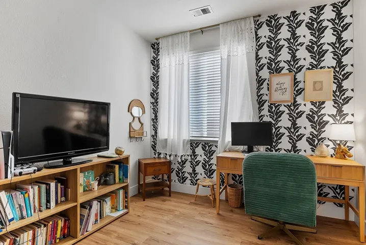 Office featuring light wood-style flooring and baseboards