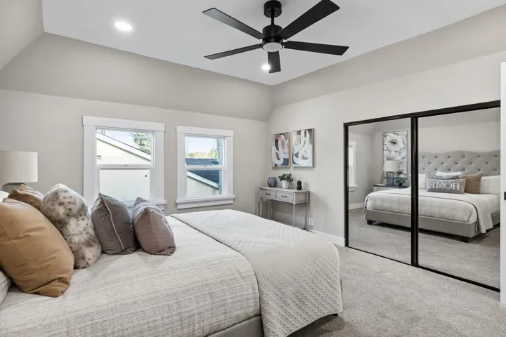 Bedroom featuring carpet floors, a closet, recessed lighting, ceiling fan, and lofted ceiling