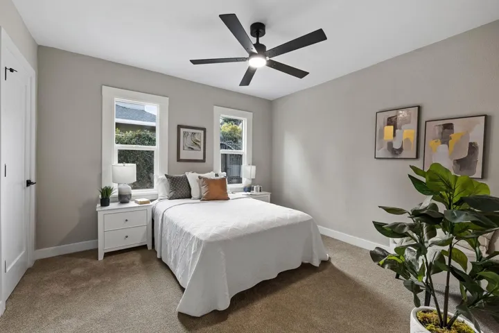 Bedroom with carpet floors and ceiling fan