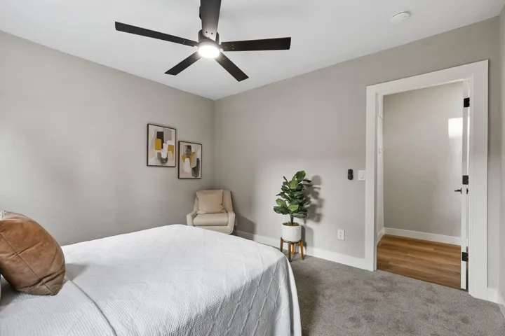 Bedroom with carpet floors and ceiling fan