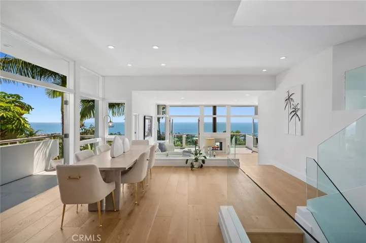 Set against a stunning backdrop of unobstructed, 180-degree vistas stretching across the Pacific Ocean and Catalina Island, this exceptional 4-bedroom, 4-bathroom home offers over 3,300 square feet of elevated coastal living.