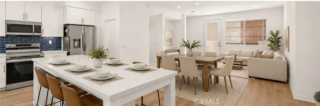 Kitchen to dining/living room virtually staged
