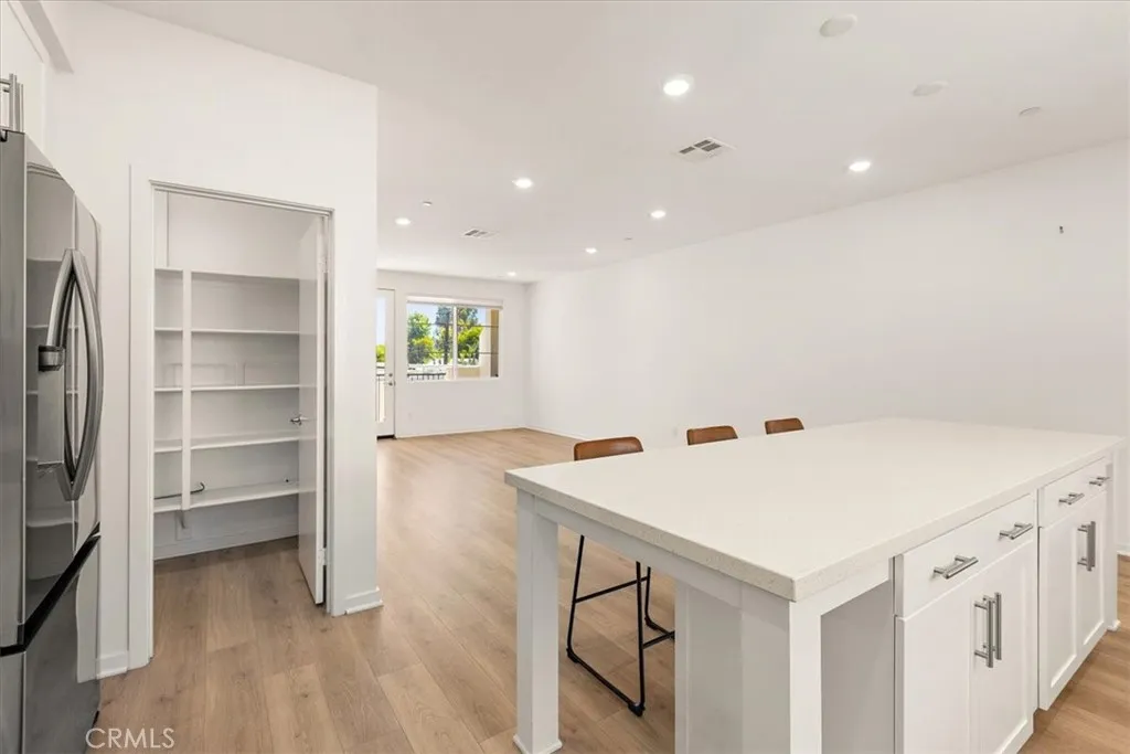 Large kitchen island and walk-in pantry