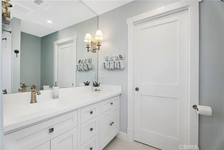 SECOND BATH UPSTAIRS FOR BEDROOM 2 - 
WITH LAUNDRY ROOM DOOR CLOSED